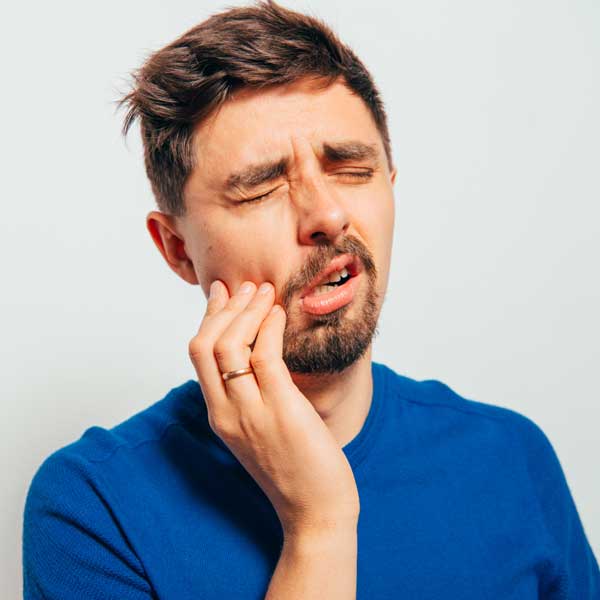 Man experiencing tooth pain needs Provo emergency dentist